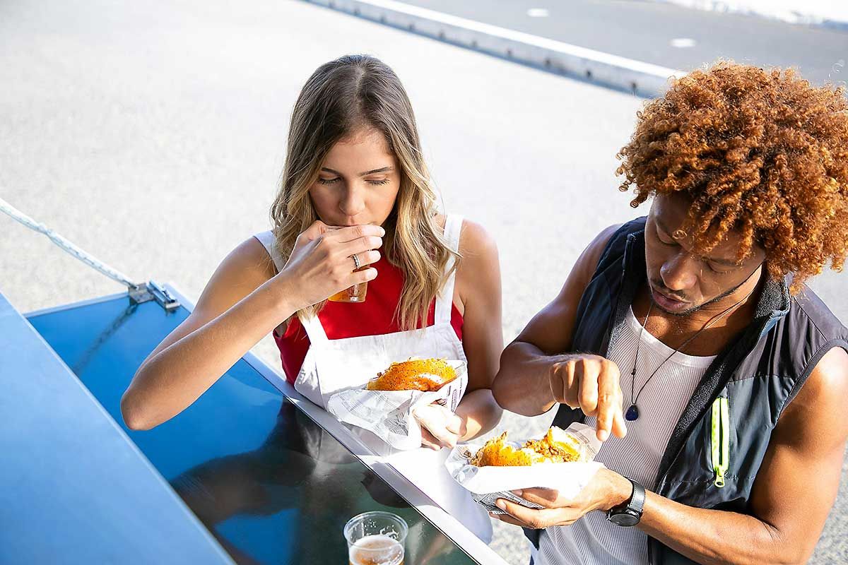 Two people eating a meal